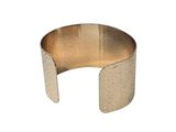 an image of a gold cuff bracelet with a metal band