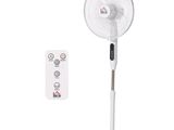an image of a white fan sitting on top of a table next to a remote control