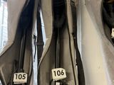 two bags that are hanging on the wall next to each other