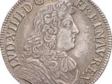a silver coin with an image of a man with long hair
