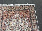 a rug that is laying on the ground on the ground