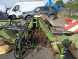 an image of a tractor with a plow attached to it