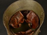 a close up of a helmet on a black background