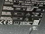 a close up of the back of a car with a sticker on it