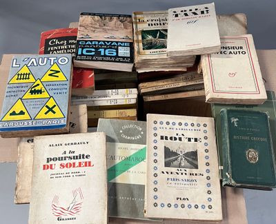 a lot of books that are sitting on a table