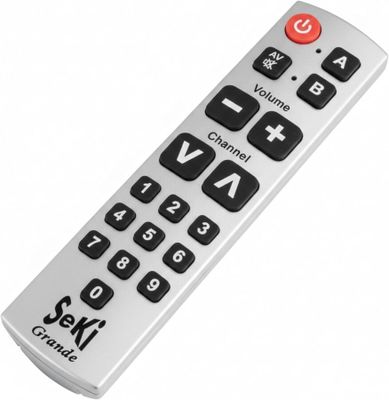 un gros plan d'une télécommande sur fond blanc