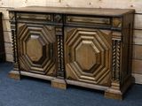 a wooden cabinet that has a door on the front