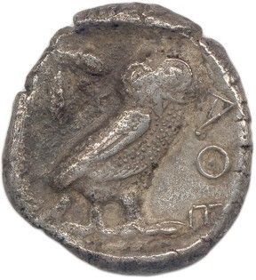 une pièce d'argent sur laquelle est représenté un oiseau
