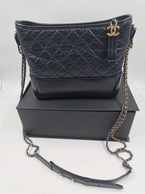 CHANEL.Sac Hobo "Gabrielle de Chanel" en cuir bleu marine ma…