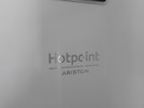 a close up of a hotpoint ariton hot water heater