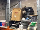 a lot of stuff on the shelves in the garage