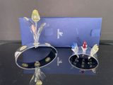 une paire de fleurs en argent et plaquées or, accompagnée d'un coffret bleu