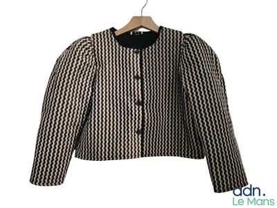 black and white jacket on a hanger on a white background