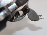 a close up of a pair of pliers and a wrench