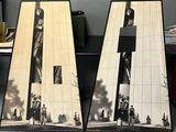 two black and white pictures of a woman on a building