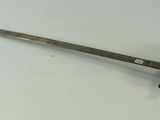 an image of a sword on a white surface