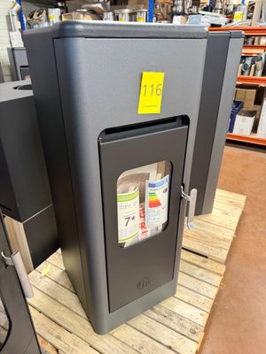 a large gray box with a yellow sticker on it