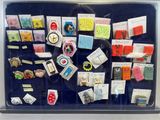 a picture of a bulletin board with many magnets on it