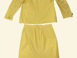 yellow jacket and shorts with buttons and buttons on the back