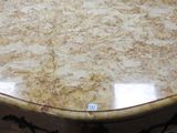 a marble table with a sticker on the top