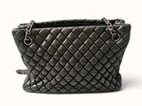 an image of a black purse with a chain strap