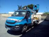 a blue truck that has a crane on the back of it