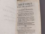 an open book with a black and white title on it
