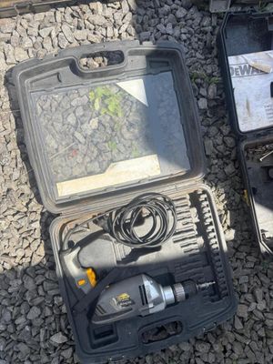 two tools in a case on the ground