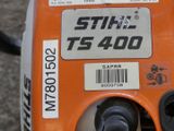 a close up of an orange and black gas powered generator