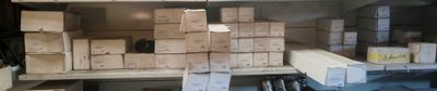 stacks of boxes on a shelf in a warehouse