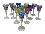 a lot of wine glasses that are sitting on the table