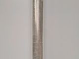 a metal tube that is sitting on a table