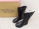 pair of black boots sitting next to a box of lovely skull