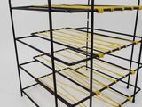 a close up of a rack with a bunch of clothes on it