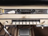a dashboard of a car with a radio and other electronics