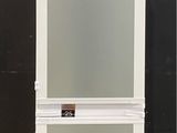 an image of a white refrigerator with a glass door