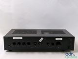 a close up of a black amplifier on a white background