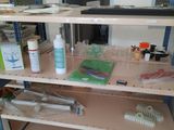 a shelf with various items on it in a room