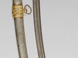pair of silver and gold - plated sabers from the late 19th century