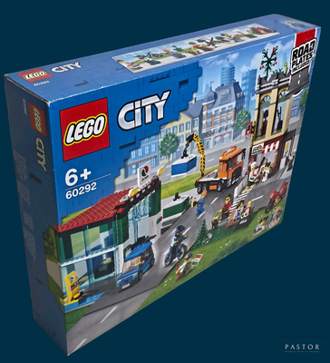 a box with a lego city set in it