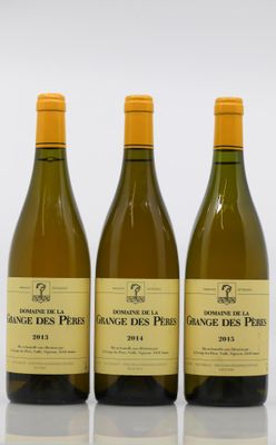 three bottles of wine sitting on top of a table next to each other