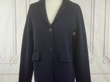 a close up of a black jacket on a mannequin dummy
