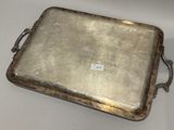 a silver tray that has a handle on it