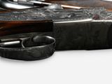 a close up of a pair of shotguns on a table