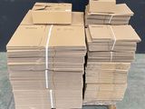 a lot of boxes that are stacked up on a carton