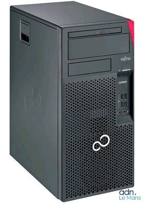 a black desktop computer with a red keyboard on top of it