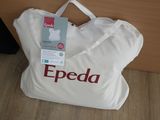 un sac blanc orné du logo Epeda en rouge