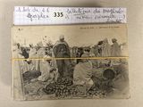 an old black and white photo of a group of people at a market