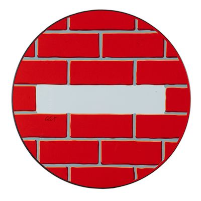 a red brick wall with a white stripe in the middle