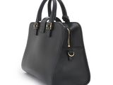 a black handbag on a white background